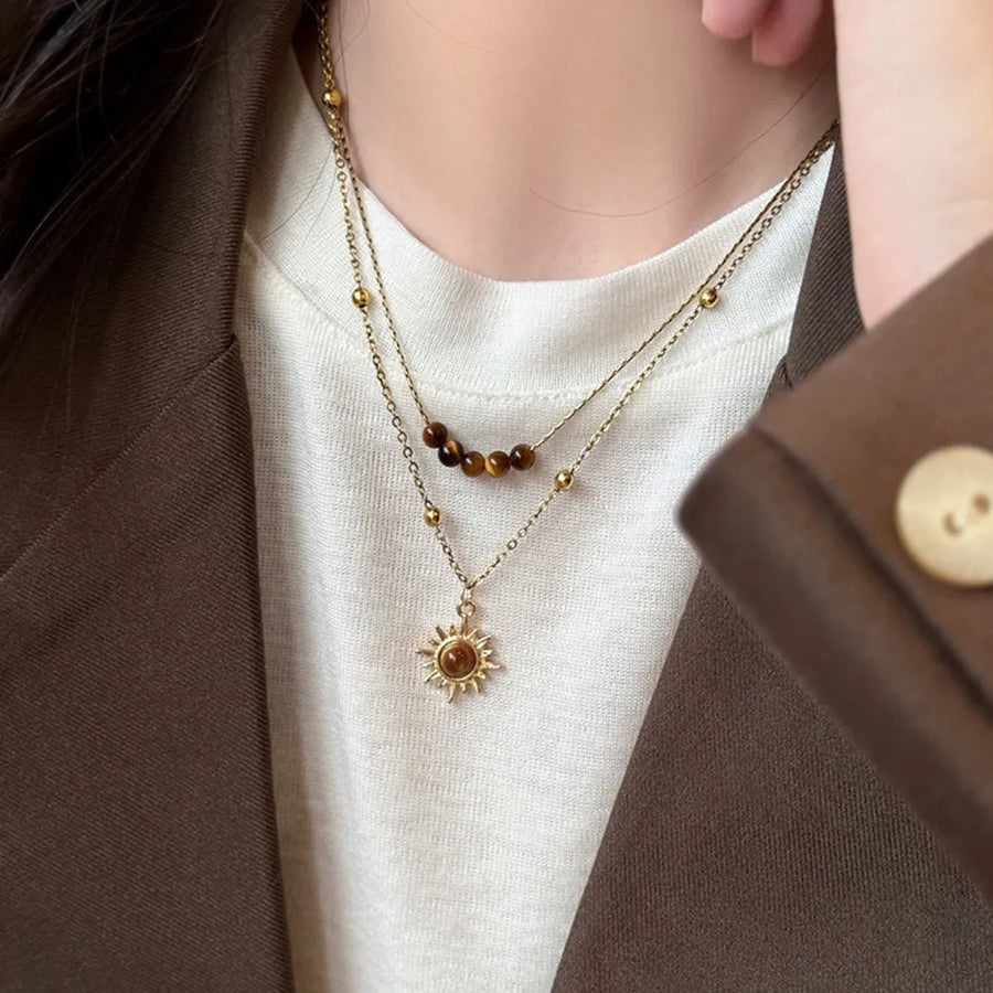 Copper, Gold-plated, Tiger' necklace in golden brown with straight silhouette