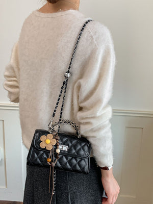 crossbody bag featuring quilted in Black with PU Leather Imported Size & texture