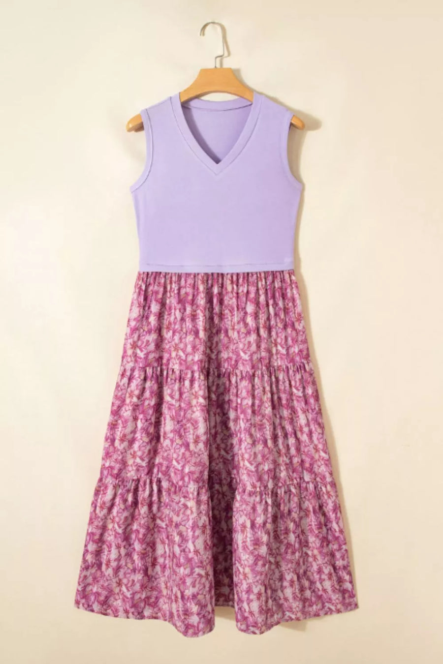 Floral tiered maxi dress with ribbed lavender V-neck bodice and pink floral print skirt.
