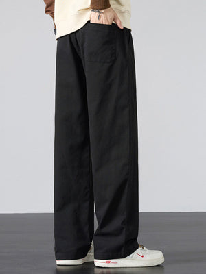 Men's Plus Size Pocketed Drawstring Wide Leg Pants in Khaki with drawstring waist