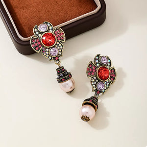 Synthetic Pearl, Glass, Zinc alloy Care instructions: Avoid wearing during exerc earrings in ivory with drop silhouette