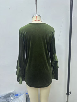 100% polyester Care instructions: Machine wash cold blouse in Plum Purple with relaxed silhouette