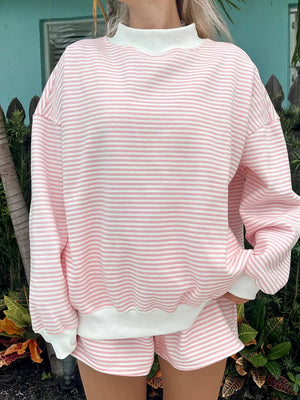 blush pink sweatshirt with striped and mock neck
