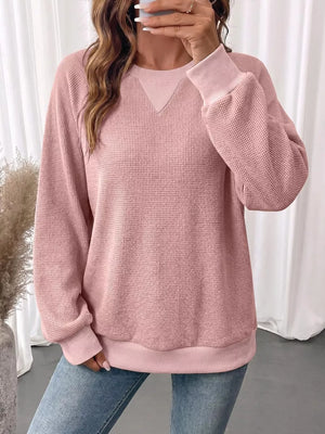 sweatshirt in blush pink featuring waffle knit and relaxed fit
