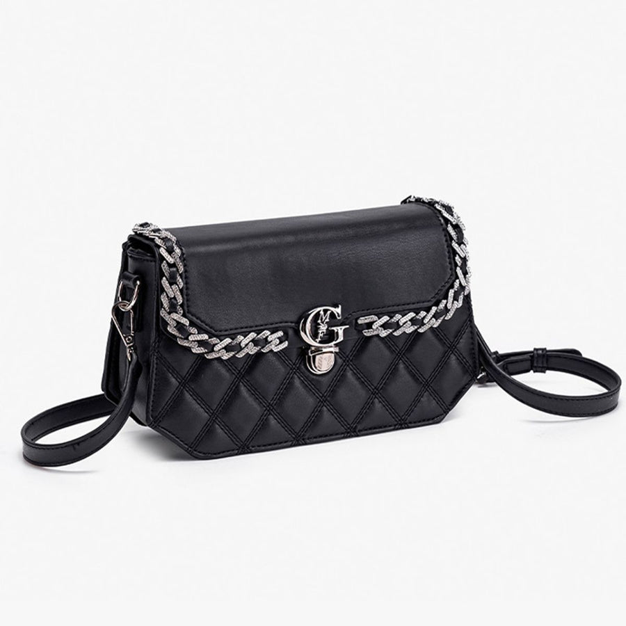 Black crossbody bag with flap and quilted