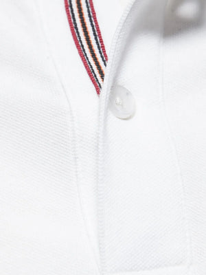 White piqué polo shirt with striped trim and button detail