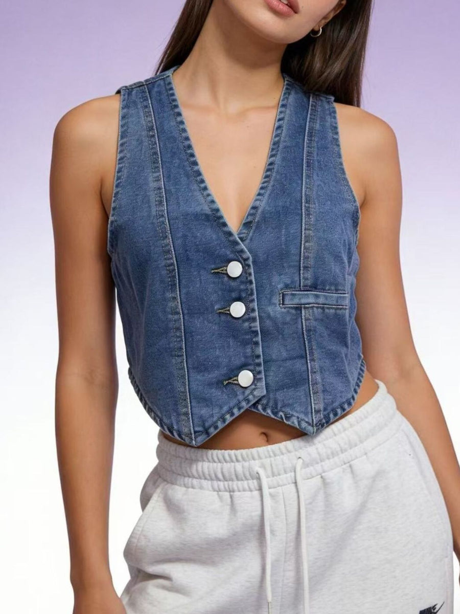 Chic button-down denim vest in dark blue with a V-neck and chest pocket.