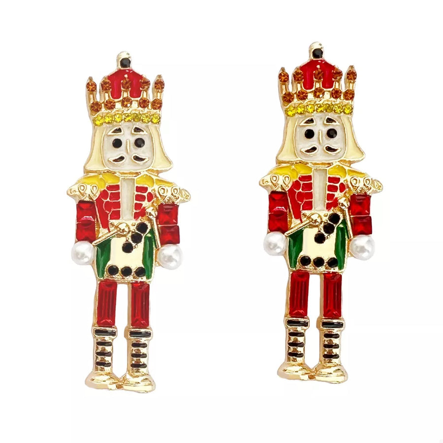 Red and gold nutcracker dangle earrings with pearl accents.