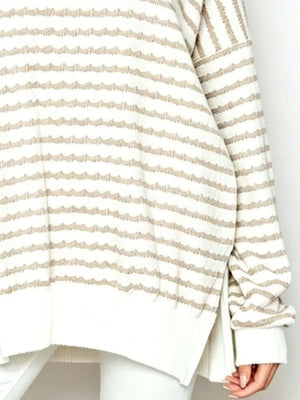 tan pullover sweater featuring oversized and striped