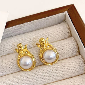 earrings in gold featuring angel motif and regular fit
