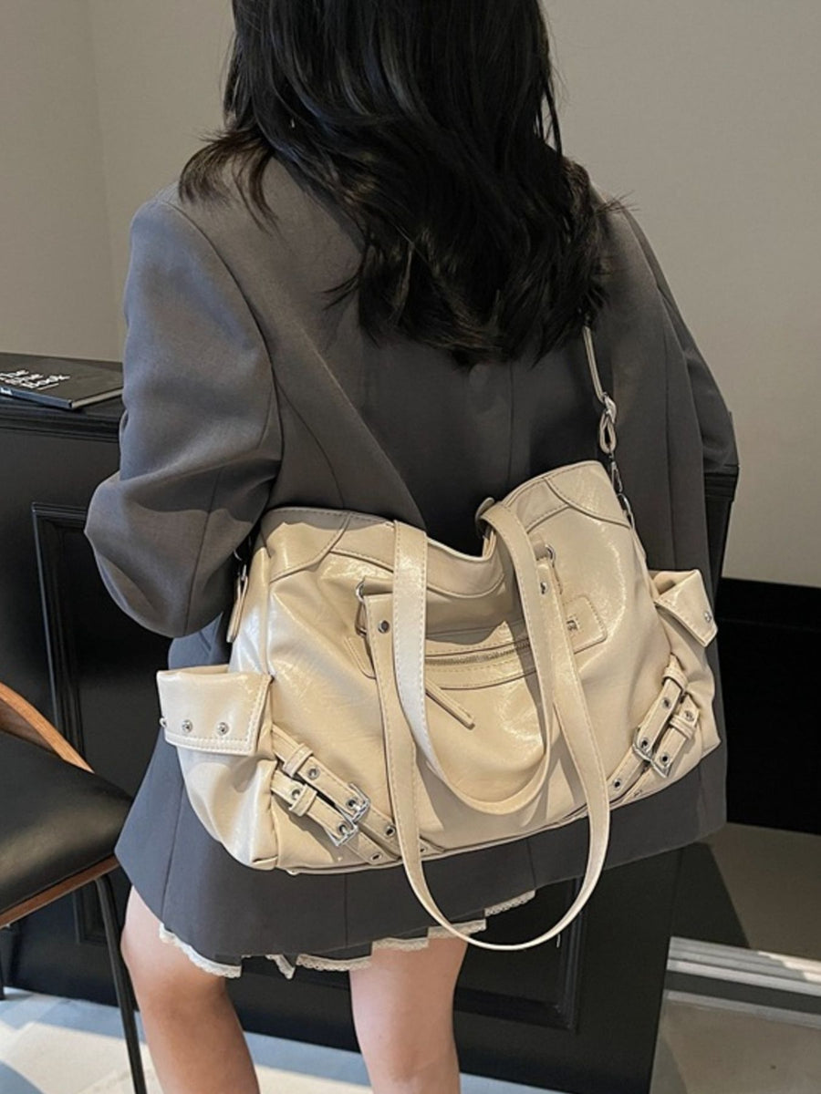 Black with handbag with buckle accents 11