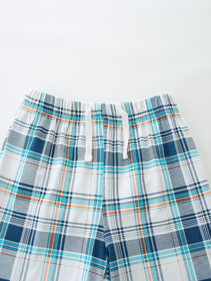 Boys' cotton plaid shorts with drawstring waist and elastic waistband.