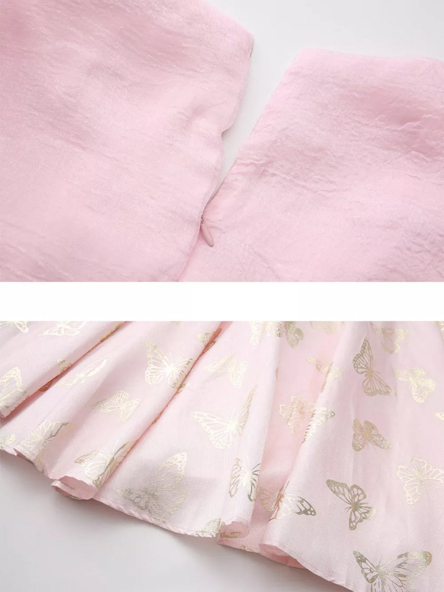 Pink midi dress with gold butterfly print and cinched waist detail
