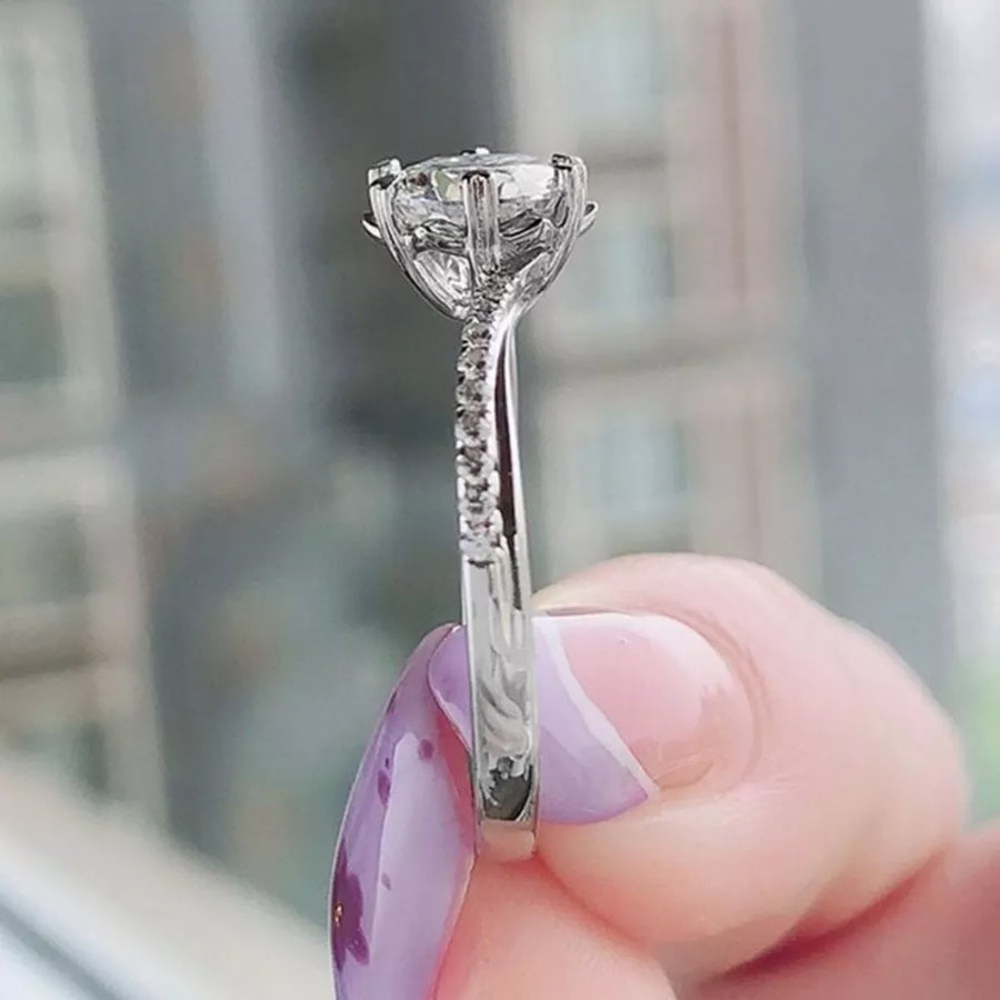 925 sterling silver,Moissanite,1ct Carat weight: 1ct Care instructions: Avoid we ring in Silver with fitted silhouette