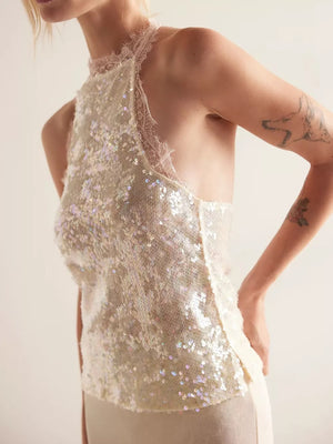 White sequin halter cami with lace trim and a high neckline.