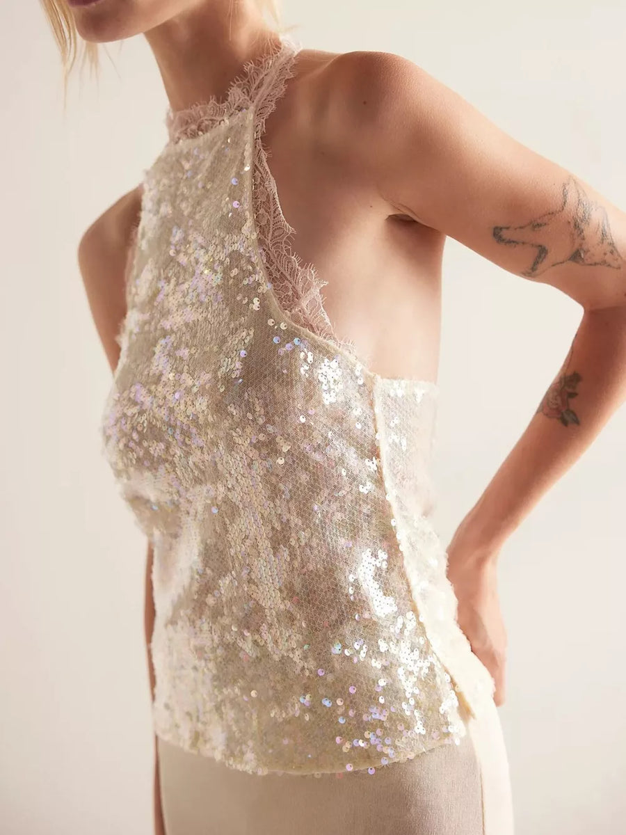 White sequin halter cami with lace trim and a high neckline.
