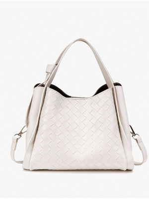 crossbody bag in cream with woven and adjustable strap