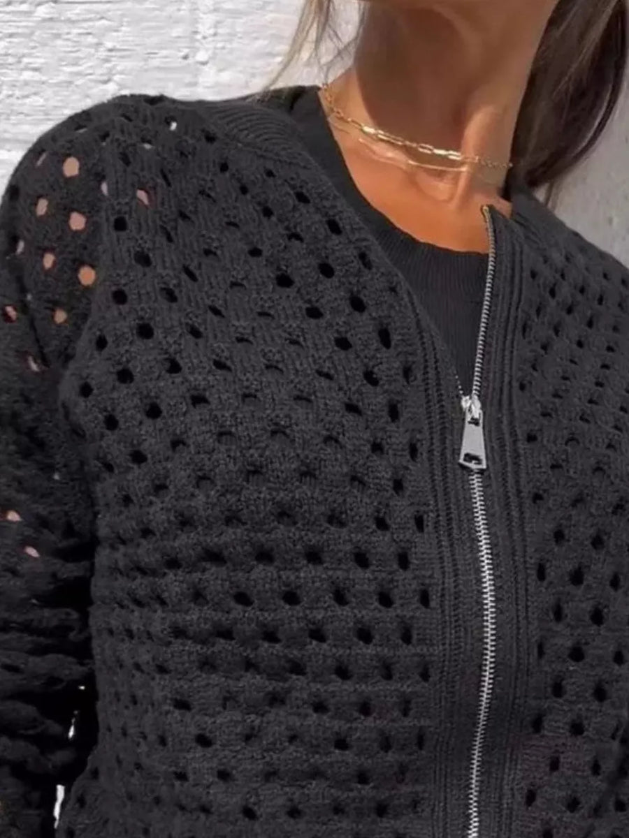 White cardigan featuring zipper and openwork
