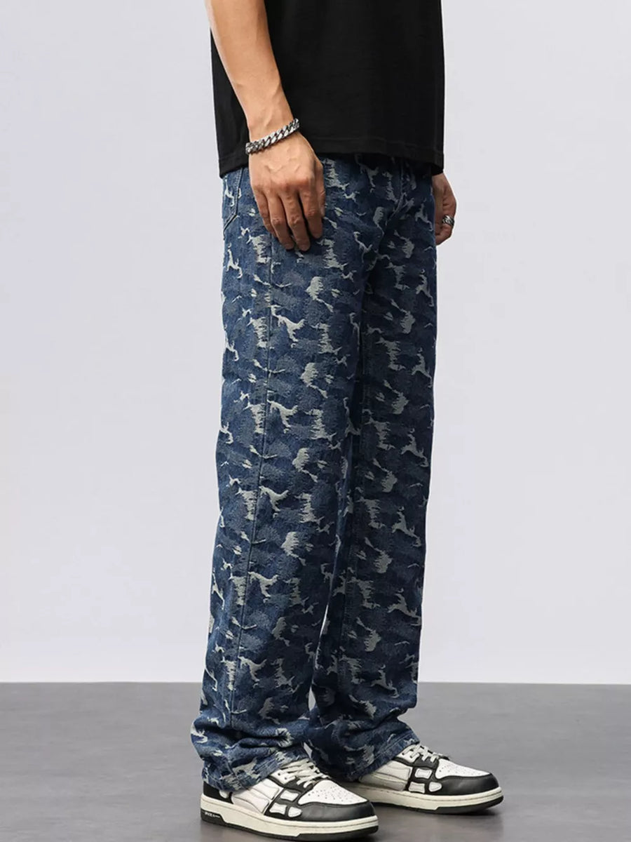 Relaxed fit blue cotton jeans with an abstract camouflage pattern