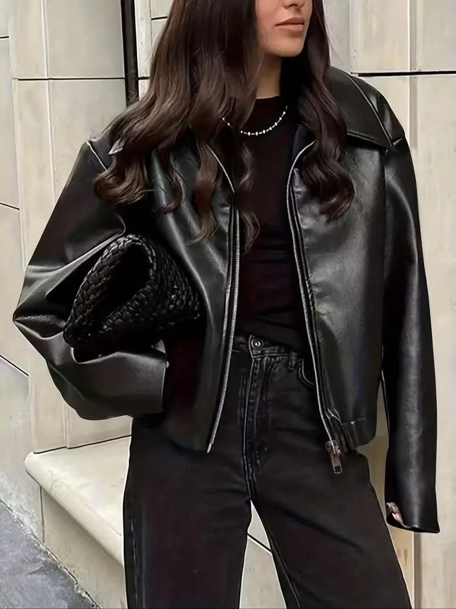 moto jacket in black featuring collared and oversized fit