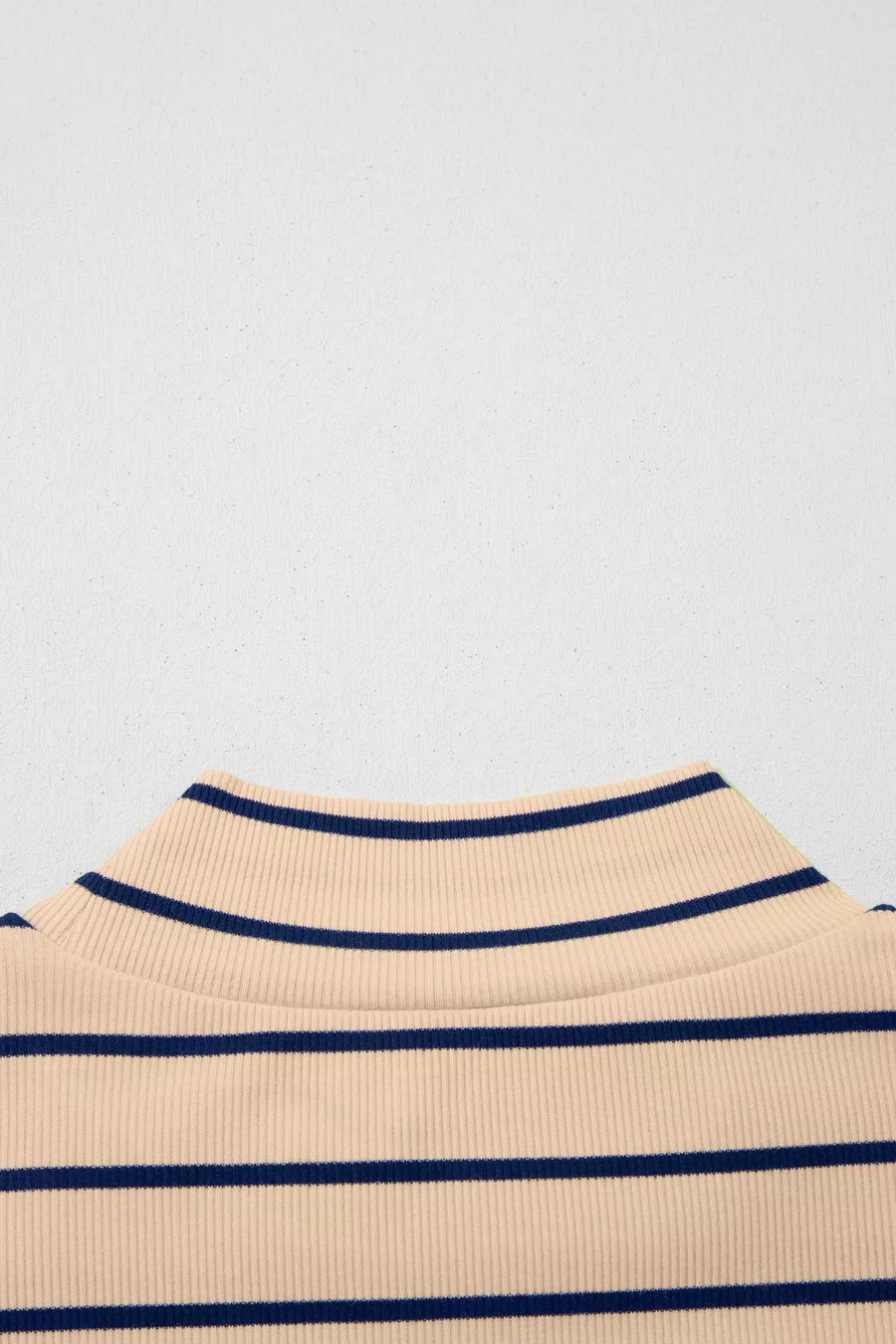 Striped mock neck t-shirt in beige and navy blue cotton with ribbed texture.