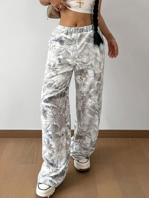 wide-leg pants in white featuring pocketed and loose fit