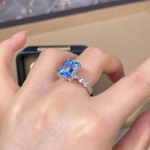silver ring featuring zircon accents and geometric