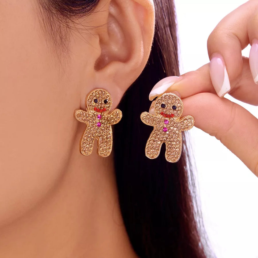 earrings in gold featuring rhinestone embellishment and stud fit