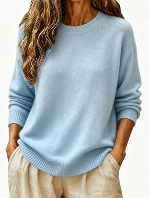 100% polyester Care instructions: Machine wash cold pullover sweater in Sky Blue with loose silhouette