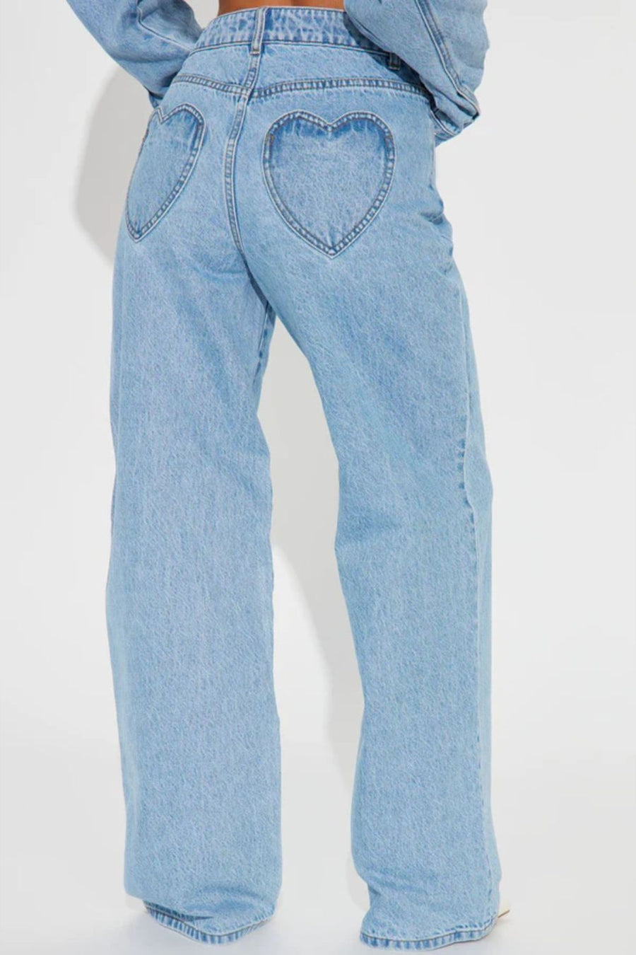 85% cotton, 15% polyester Care instructions: Machine wash cold wide-leg jeans in Light Blue with flared silhouette
