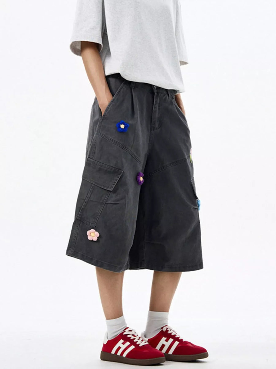 Dark Gray cotton cargo shorts with floral appliques and wide legs.