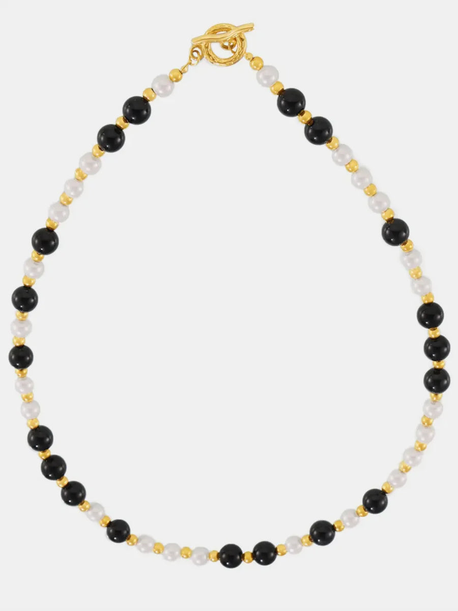 Gold toggle necklace with black onyx and white pearl beads