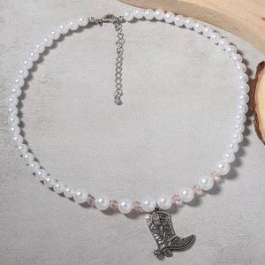 Synthetic Pearl, Zinc alloy, Silver-plated Care instructions: Avoid wearing duri necklace in silver with straight silhouette