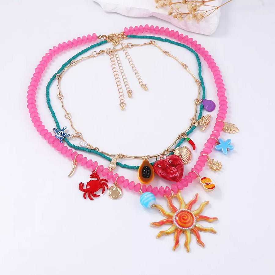 18K Gold-Plated,Alloy,Plastic Care instructions: Avoid wearing during exercise, necklace in gold with layered silhouette