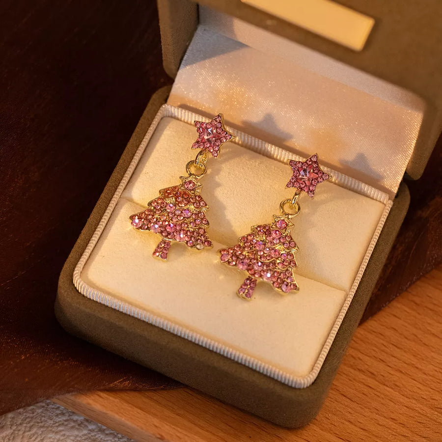 fuchsia earrings featuring rhinestone embellishment and novelty