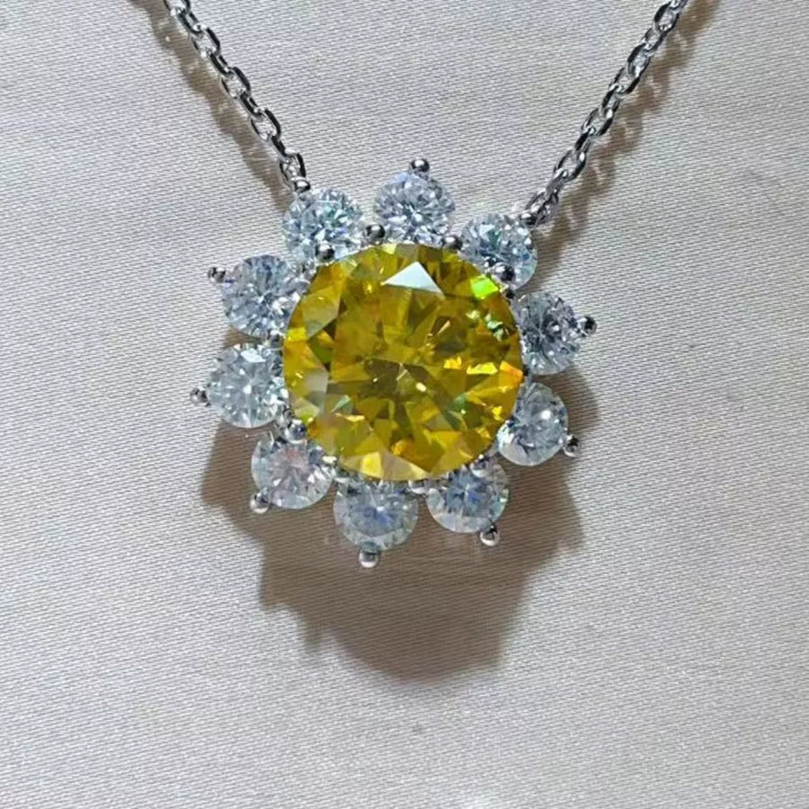 silver necklace featuring 5 carat moissanite and floral