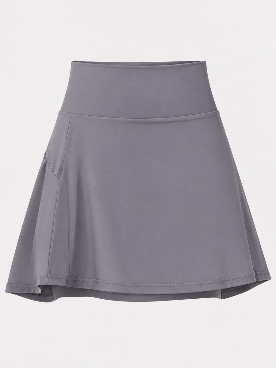 88% nylon, 12% spandex pleated skirt in Light Pink - New with flared silhouette