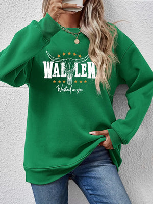 Green graphic drop shoulder sweatshirt with bull skull and text detail