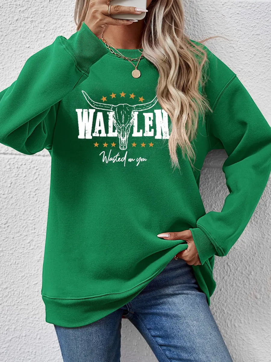 Green graphic drop shoulder sweatshirt with bull skull and text detail
