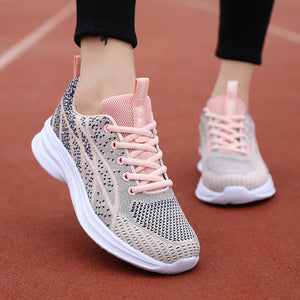 Textured knit performance runners in Pale Blush with pink laces and white soles.