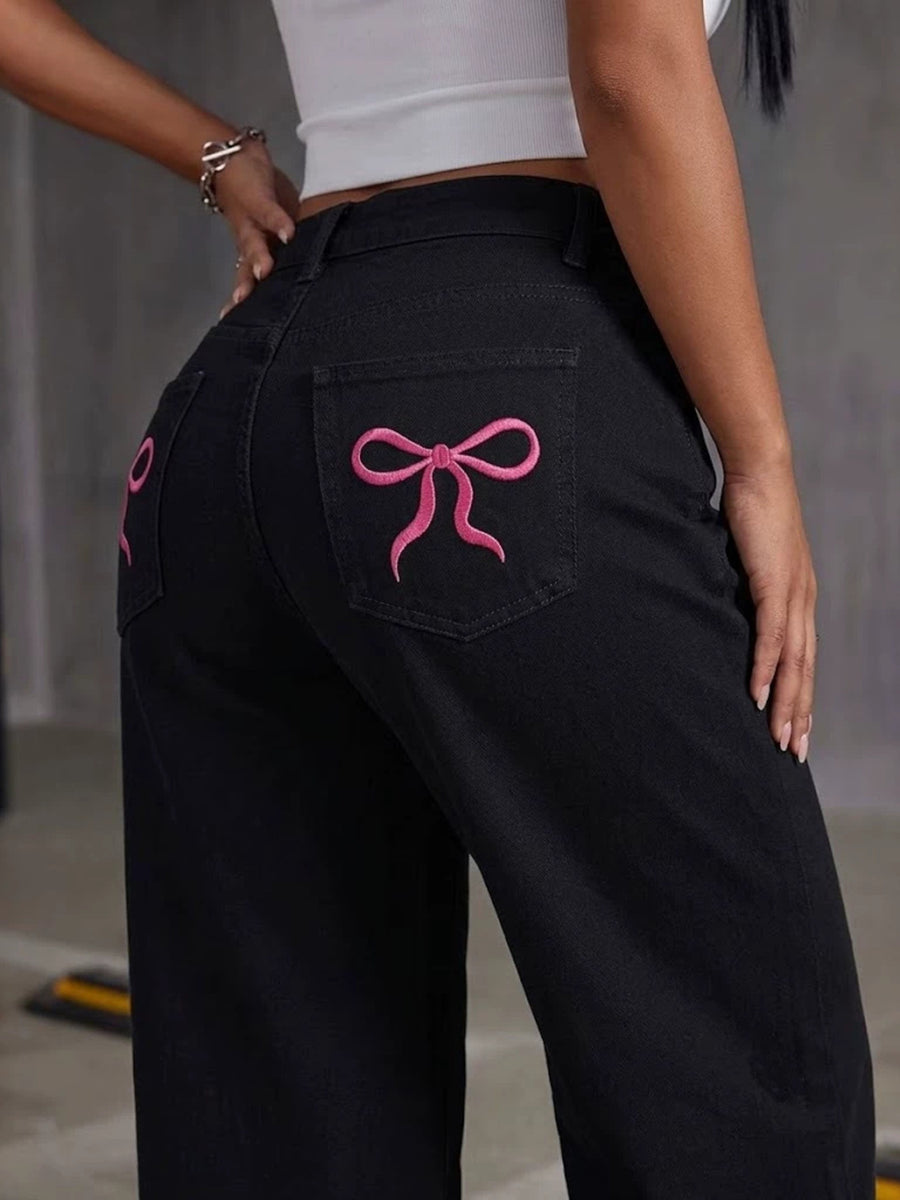 Black wide-leg jeans with full-length and button-front