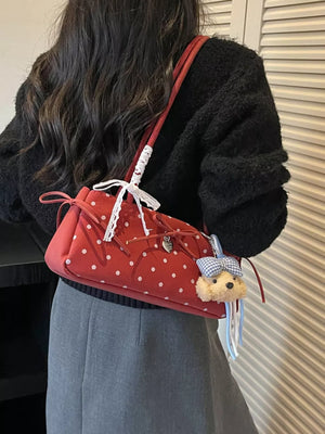 shoulder bag in red featuring polka dots and boxy fit
