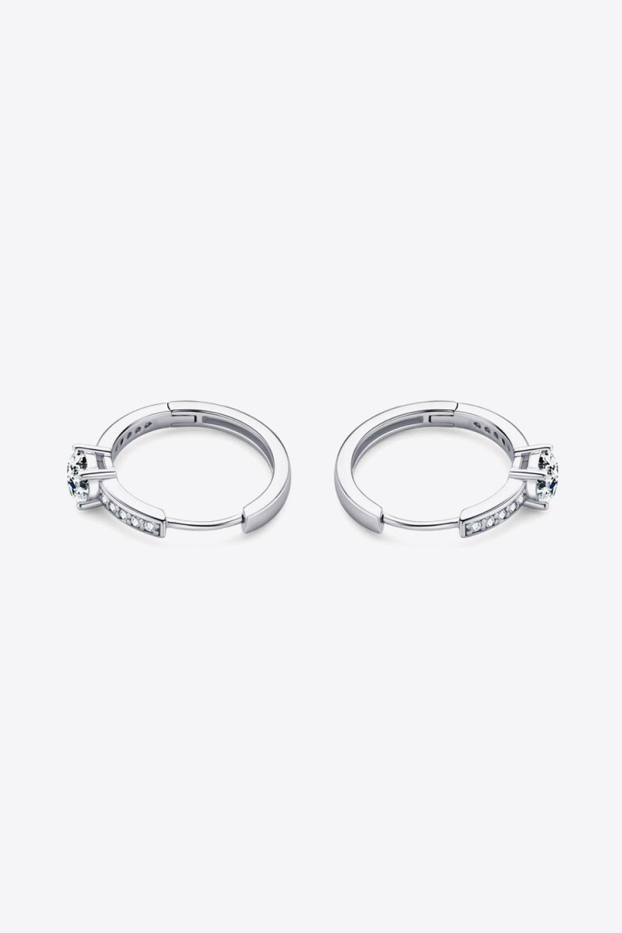 Silver pavé halo moissanite hoop earrings with a central stone