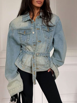 denim jacket in light blue featuring buttoned and relaxed fit