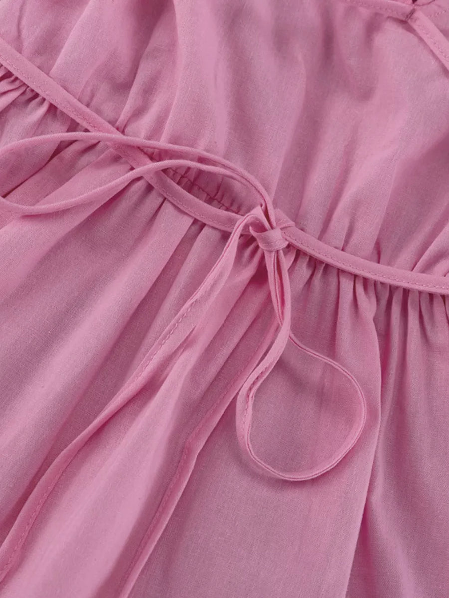 Pink linen blend dress with tie waist and spaghetti straps