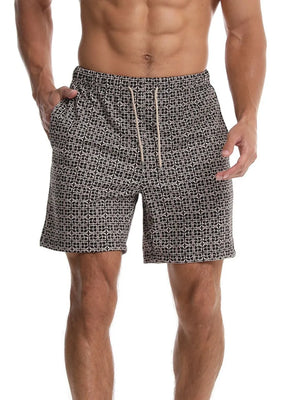 Geometric print boardshorts in black with drawstring waist and side pockets.