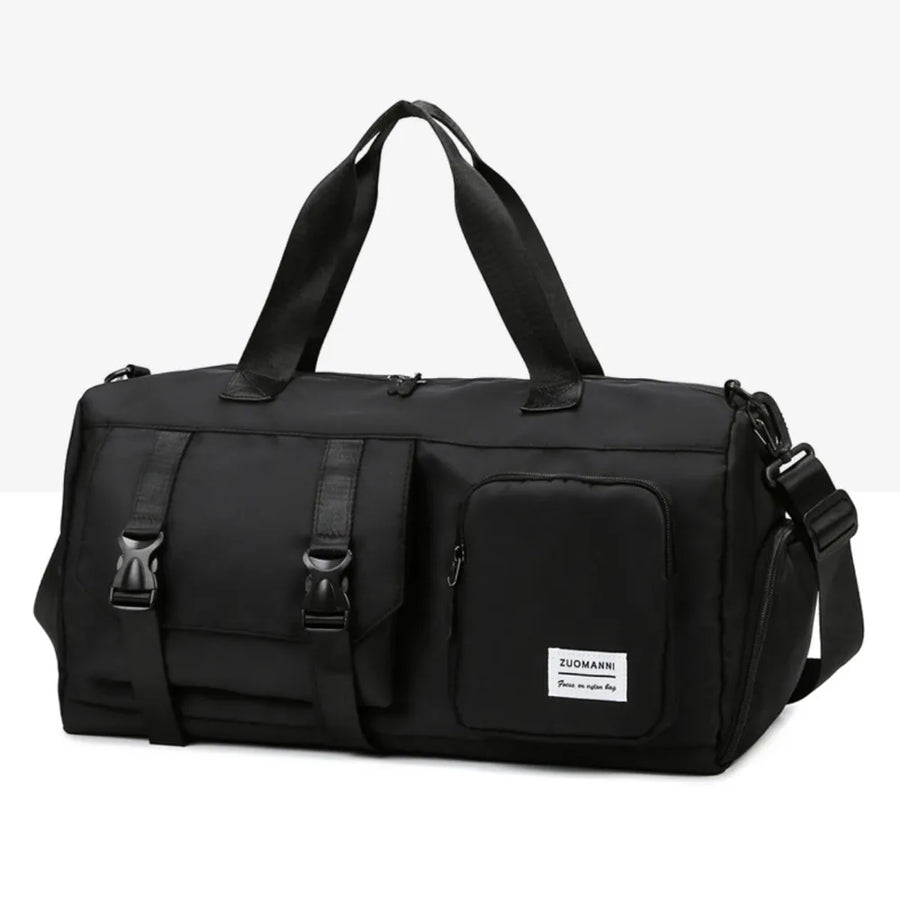 Black duffel bag with buckle details and multiple pockets, perfect for travel or gym.