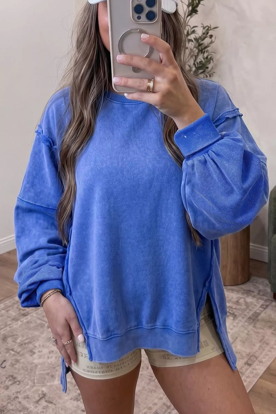 100% polyester Care instructions: Machine wash cold sweatshirt in Royal Blue with loose silhouette