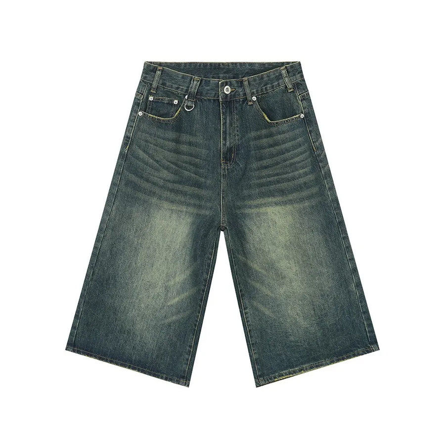 Wide-leg denim culottes in a distressed blue wash with a relaxed fit.