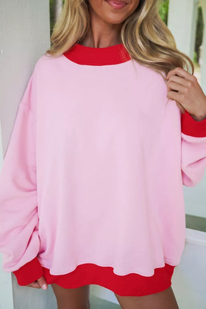 Pink sweatshirt featuring contrast trim and color-block